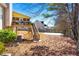 Large backyard with elevated deck, screened porch and basketball court at 4901 Planters Walk, Douglasville, GA 30135