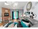 Open living room featuring a brick fireplace and comfortable seating at 4901 Planters Walk, Douglasville, GA 30135