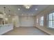 Bright dining room with hardwood floors and a modern chandelier at 1616 Ruskin Way, Marietta, GA 30062