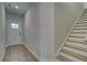 Bright entryway with stairs and neutral color palette at 1616 Ruskin Way, Marietta, GA 30062