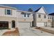 Modern townhomes with attached garages and attractive landscaping at 1616 Ruskin Way, Marietta, GA 30062