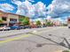 Attractive town square with shops and parked cars at 1616 Ruskin Way, Marietta, GA 30062