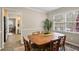 Inviting dining area with a classic wooden table and view of the backyard at 1867 Falcon Wood Ne Dr, Marietta, GA 30066