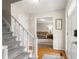 Welcoming foyer with staircase and hardwood floors at 1867 Falcon Wood Ne Dr, Marietta, GA 30066