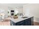 Stylish kitchen island with quartz countertop and sink at 4160 Cavalier Way, Duluth, GA 30097