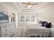 Main bedroom with a ceiling fan and large windows at 4160 Cavalier Way, Duluth, GA 30097