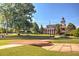 Quaint town square with a clock tower and manicured lawns at 4160 Cavalier Way, Duluth, GA 30097