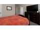 Bedroom featuring a bed, dresser, and a view of the doorway at 4417 Green Pastures Way, Ellenwood, GA 30294