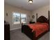 Bedroom featuring traditional style with an ornate wood bed frame at 4417 Green Pastures Way, Ellenwood, GA 30294