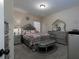 Serene bedroom with plush carpeting, a decorative headboard, and ample natural light at 4417 Green Pastures Way, Ellenwood, GA 30294