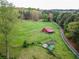 Farmland with barn, chicken coop, and a winding driveway at 1907 Old Loganville Rd, Loganville, GA 30052