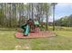 Wooden playset with slide and swings in a spacious backyard at 1907 Old Loganville Rd, Loganville, GA 30052