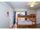 Cozy bedroom with a bunk bed and plenty of natural light at 1907 Old Loganville Rd, Loganville, GA 30052