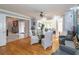 Charming dining area with glass table, seating for four, and hardwood floors at 1907 Old Loganville Rd, Loganville, GA 30052