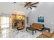 Vaulted ceilings and a stone fireplace in this living room at 1907 Old Loganville Rd, Loganville, GA 30052