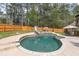 Relaxing pool with stonework and a waterslide, perfect for summer fun at 1907 Old Loganville Rd, Loganville, GA 30052