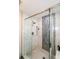 Large walk-in shower with glass enclosure and modern fixtures at 1907 Old Loganville Rd, Loganville, GA 30052