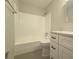 Clean bathroom with a shower/tub combo and updated vanity at 517 Stonehedge Dr, Stone Mountain, GA 30087