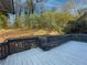 Wooden deck overlooking wooded backyard at 517 Stonehedge Dr, Stone Mountain, GA 30087