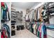 Large walk-in closet with ample shelving and hanging space at 5710 Breitling Dr, Cumming, GA 30028