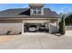 Two-car garage with ample storage space and room for vehicles at 5710 Breitling Dr, Cumming, GA 30028