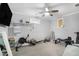 Basement home gym with rowing machine, weights, and exercise ball at 5710 Breitling Dr, Cumming, GA 30028