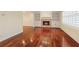 Hardwood floors and fireplace in living room at 647 Shannon Green Cir, Mableton, GA 30126