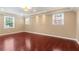 Large main bedroom with hardwood floors and neutral walls at 647 Shannon Green Cir, Mableton, GA 30126