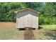 Yard storage shed with metal ramp at 647 Shannon Green Cir, Mableton, GA 30126