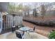 Cozy backyard patio with seating and heater at 704 Woodland, Woodstock, GA 30188