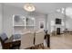 Casual dining area with hardwood floors and view to Gathering room at 704 Woodland Pl, Woodstock, GA 30188