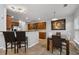 Bright kitchen with stainless steel appliances and granite countertops at 704 Woodland Pl, Woodstock, GA 30188