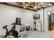 Basement gym with stationary bike, weights, and a TV at 370 Park Ne Pl, Atlanta, GA 30317