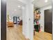 Basement hallway with light wood floors and access to storage at 370 Park Ne Pl, Atlanta, GA 30317