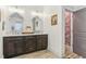 Elegant bathroom with double vanity, marble countertop, and separate toilet area at 370 Park Ne Pl, Atlanta, GA 30317