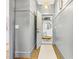 Inviting hallway with gray walls, wood floors, and built-in bench at 370 Park Ne Pl, Atlanta, GA 30317