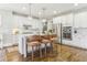 Modern kitchen with white cabinets, stainless steel appliances, and hardwood floors at 370 Park Ne Pl, Atlanta, GA 30317