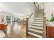 Modern staircase with white risers and wood treads, leading to upper level at 370 Park Ne Pl, Atlanta, GA 30317