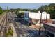 Street view showing nearby shops and railroad tracks at 523 North Ave, Hapeville, GA 30354