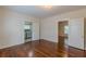 Bedroom with hardwood floors and access to laundry at 523 North Ave, Hapeville, GA 30354