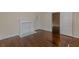 Spacious bedroom with hardwood floors and a fireplace at 523 North Ave, Hapeville, GA 30354