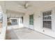 Covered porch with ceiling fan, light, and entry door at 523 North Ave, Hapeville, GA 30354