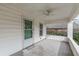 Welcoming front porch with ceiling fan and door at 523 North Ave, Hapeville, GA 30354