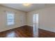 Living room featuring hardwood floors and access to other rooms at 523 North Ave, Hapeville, GA 30354