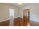 Bright living room with hardwood floors and views into other rooms at 523 North Ave, Hapeville, GA 30354