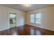 Spacious living room with hardwood floors and kitchen views at 523 North Ave, Hapeville, GA 30354