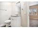 Bathroom featuring a vanity and a view into an adjacent room at 118 Strickland St, Fairburn, GA 30213