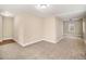 Living room featuring neutral carpet and lots of natural light at 118 Strickland St, Fairburn, GA 30213