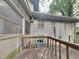Wooden deck overlooks backyard with HVAC unit at 4048 Rainbow Dr, Decatur, GA 30034