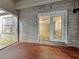 Sunroom with brick walls and access to backyard at 4048 Rainbow Dr, Decatur, GA 30034